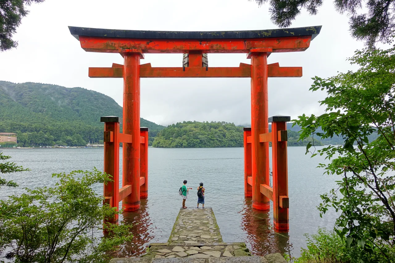 The red Peace Torii of Hakone Shrine standing in Lake Ashi