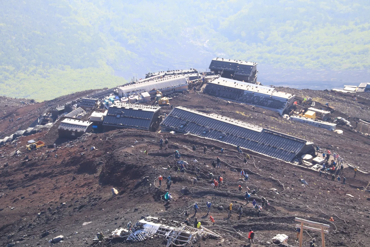 Climbers and mountain huts on the Yoshida Trail of Mount Fuji