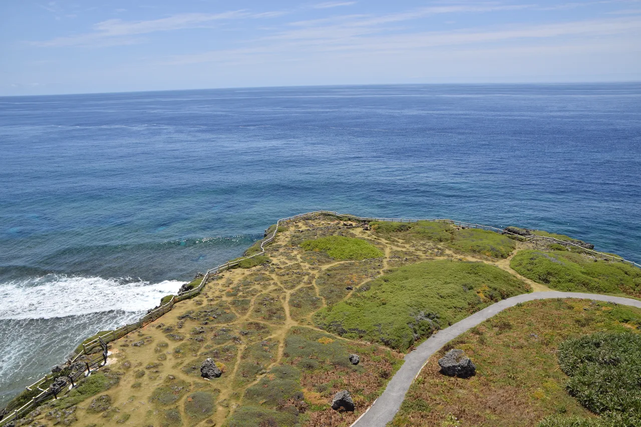 Cape Higashi-Hennazaki, a thin green finger of land between the East China Sea and the Pacific, seen from the lighthouse