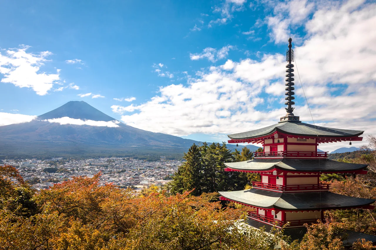 Chureito Pagoda above Fujiyoshida, with Fuji floating behind it — the most photographed view in Japan, and you don't hav