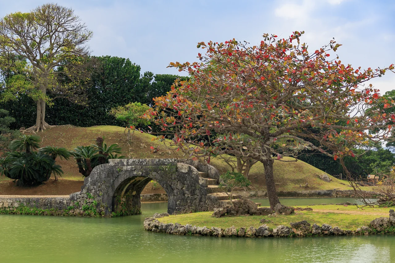 Pond, pavilion and arched bridge of the Shikinaen royal garden, Naha
