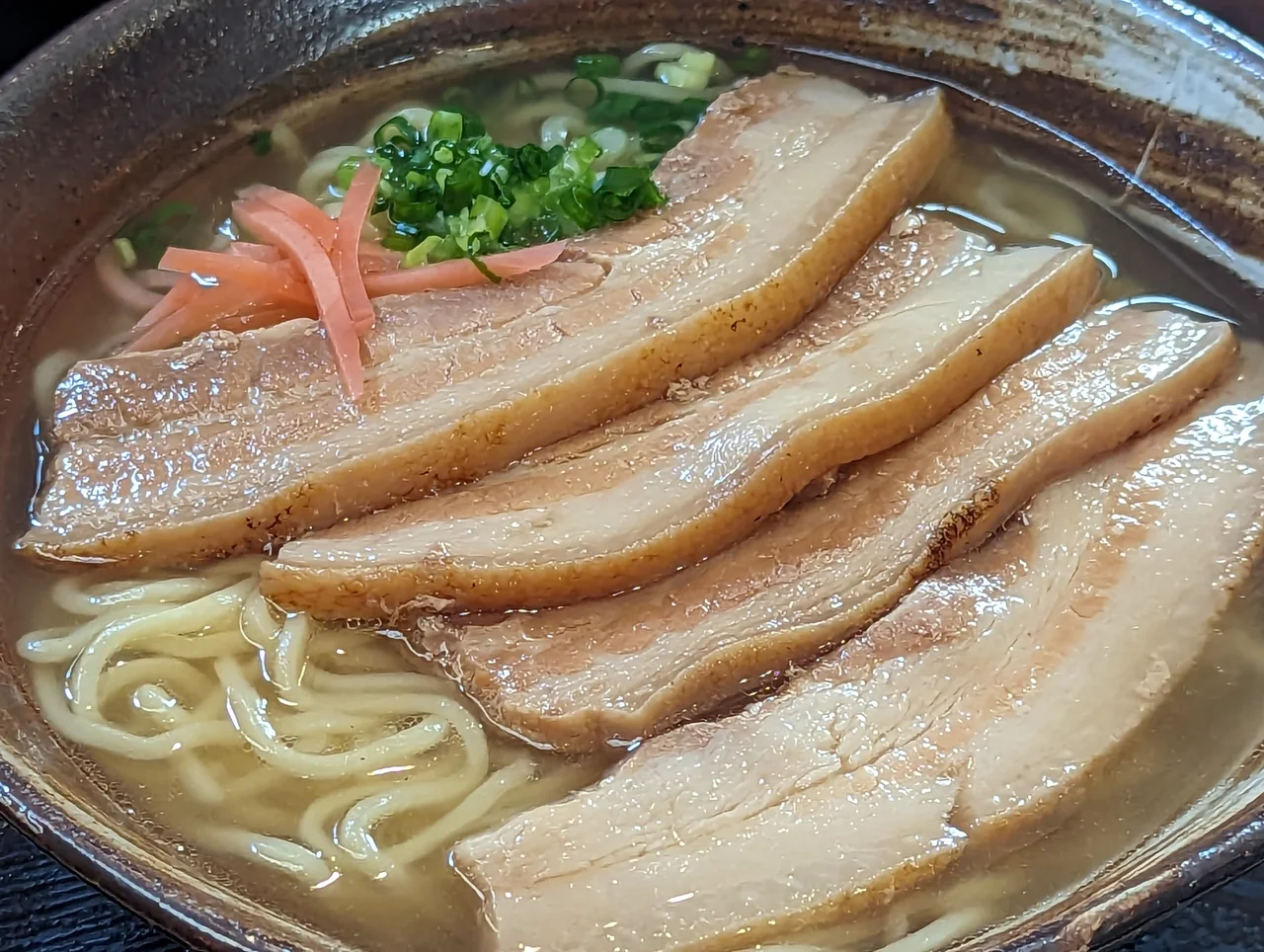 Bowl of Okinawa soba, wheat noodles in pork broth