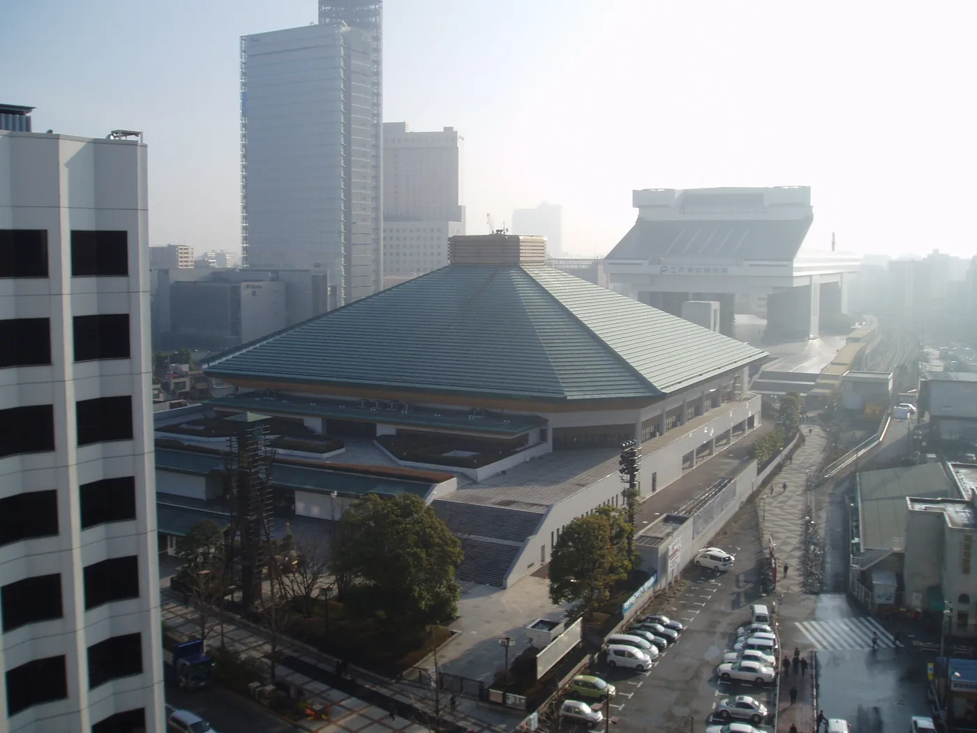 The Ryogoku Kokugikan, Japan's national Grand Sumo Hall, a two-minute walk from the museum — the easy half-day pairing. The Ryogoku Kokugikan, Japan's national Grand Sumo Hall, a two-minute walk from the museum — the easy half-day pairing.