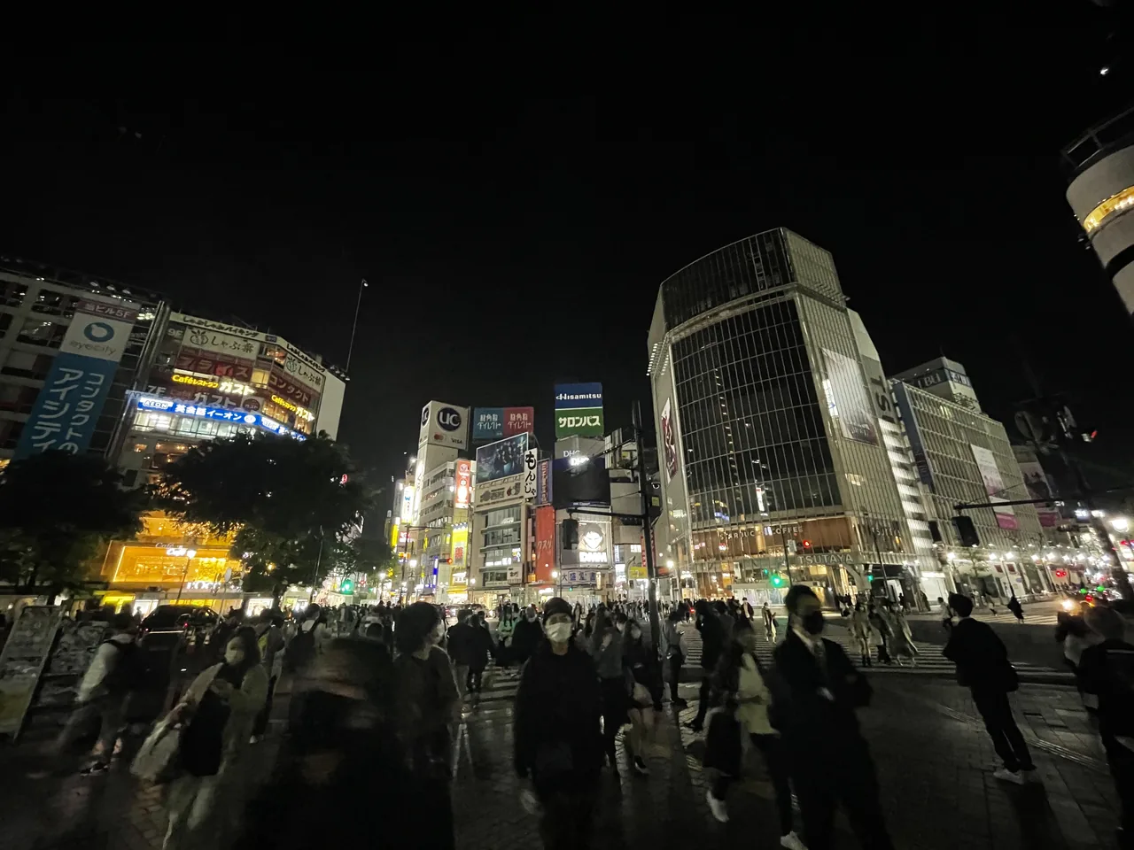 Crowds streaming across the Shibuya Scramble Crossing in Tokyo Crowds streaming across the Shibuya Scramble Crossing in Tokyo