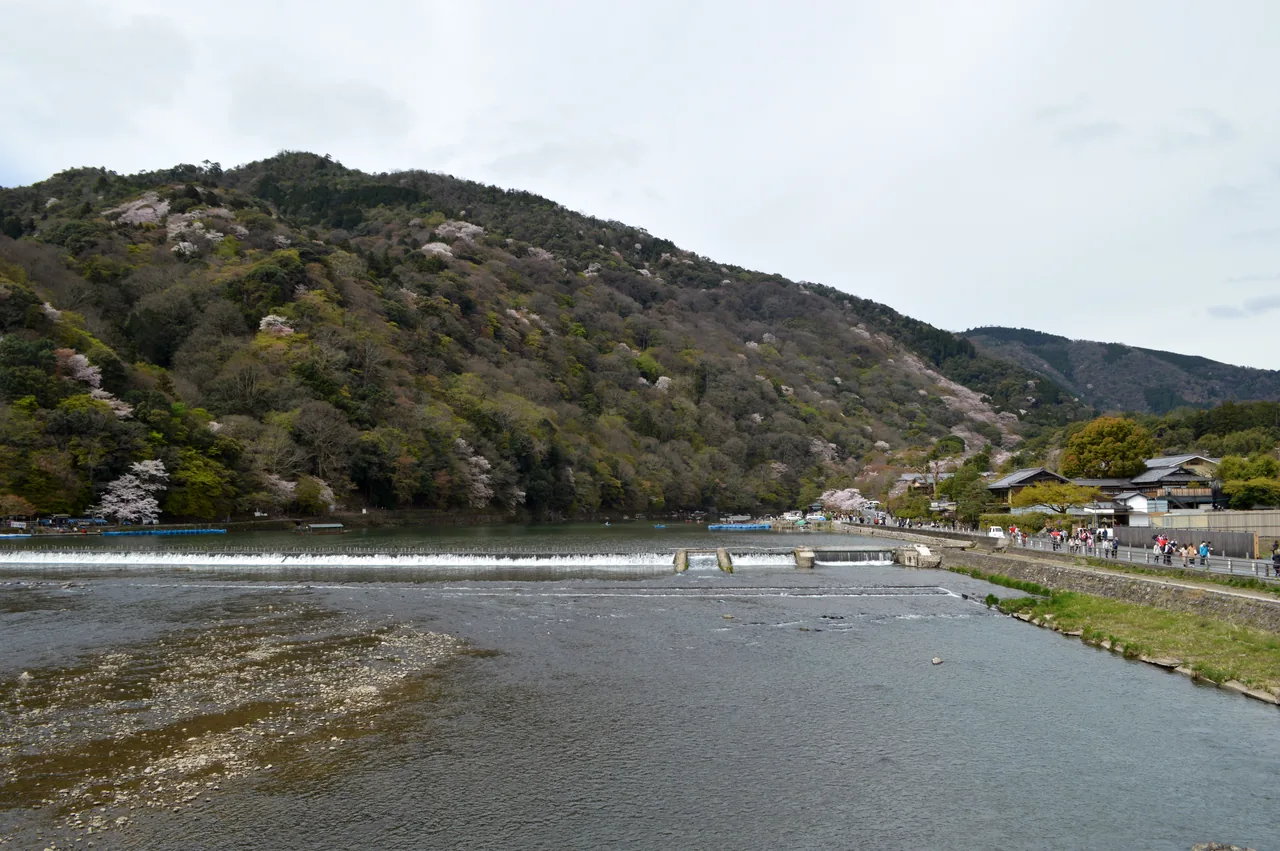 The Togetsukyo Bridge and Arashiyama hills beside the Hozu River in Kyoto The Togetsukyo Bridge and Arashiyama hills beside the Hozu River in Kyoto