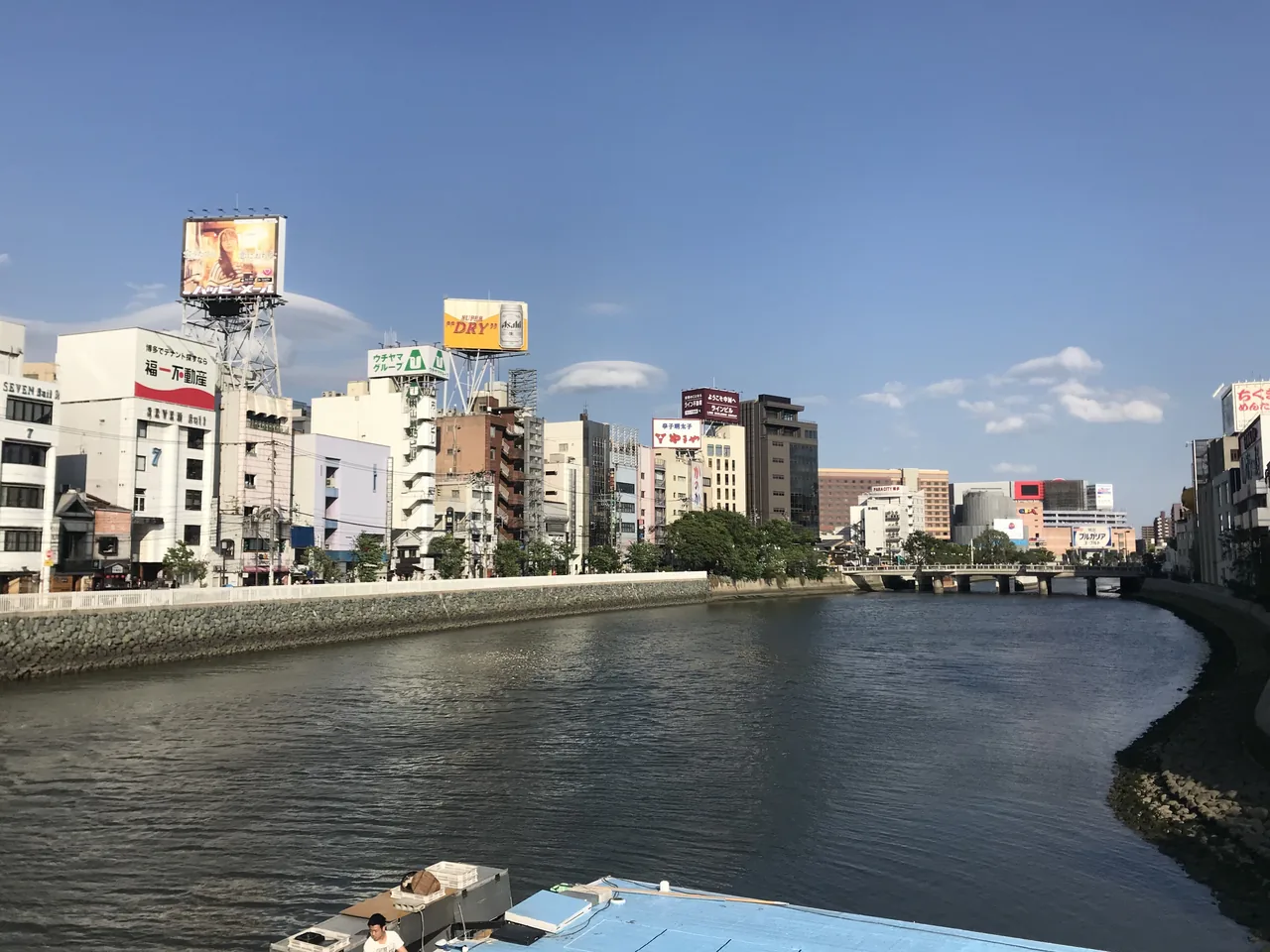 Fukuoka's Nakagawa riverfront and city skyline seen from the Fukuhaku Deaibashi bridge