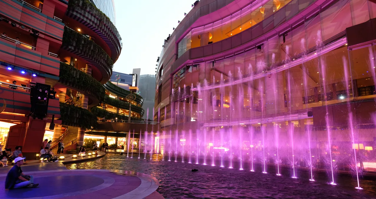 The lit dancing fountains in the canal at Canal City Hakata after dark The lit dancing fountains in the canal at Canal City Hakata after dark
