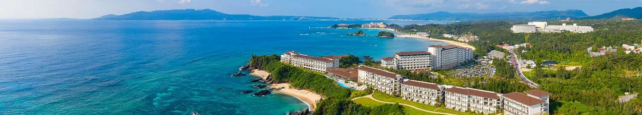 Aerial view of Halekulani Okinawa spread along the Onna coast on Okinawa's west shore