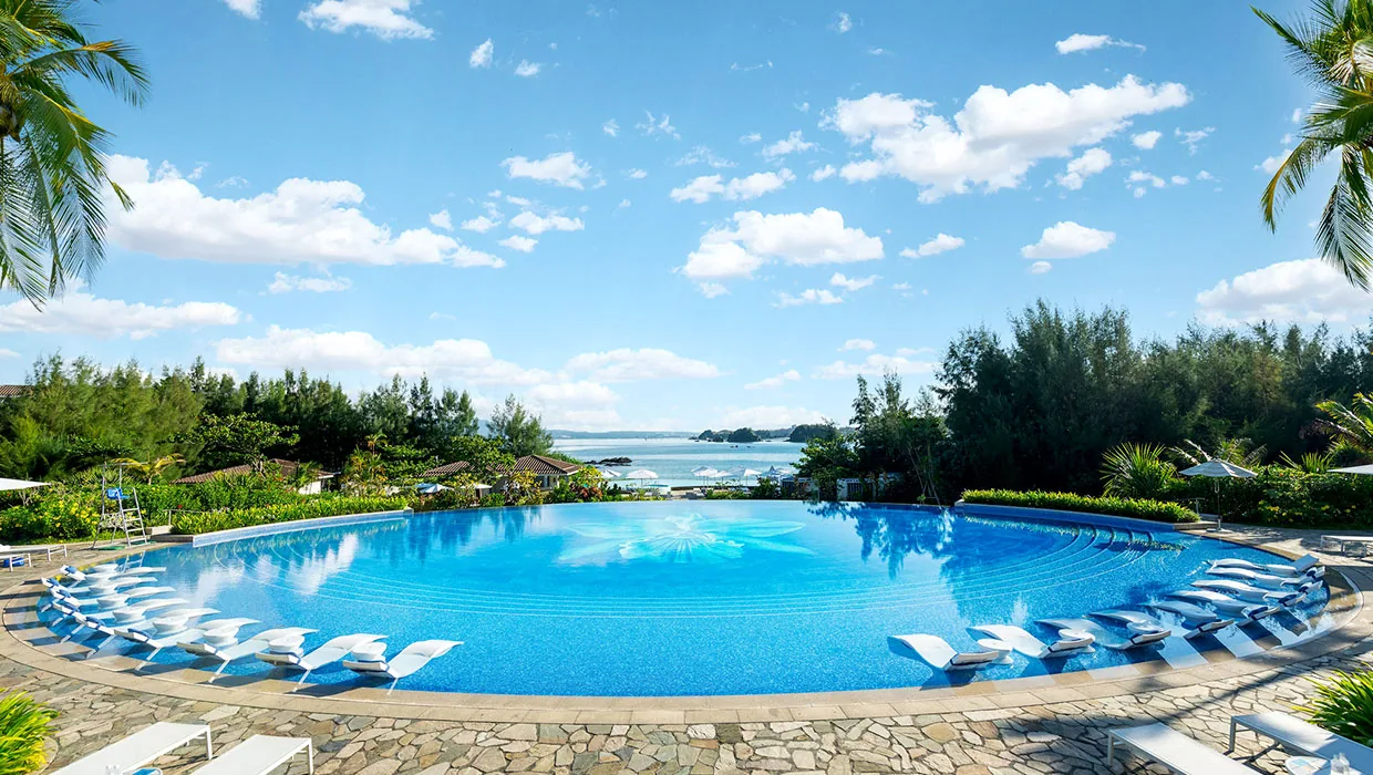The Orchid Pool and East China Sea at Halekulani Okinawa, a five-star beachfront resort in Onna