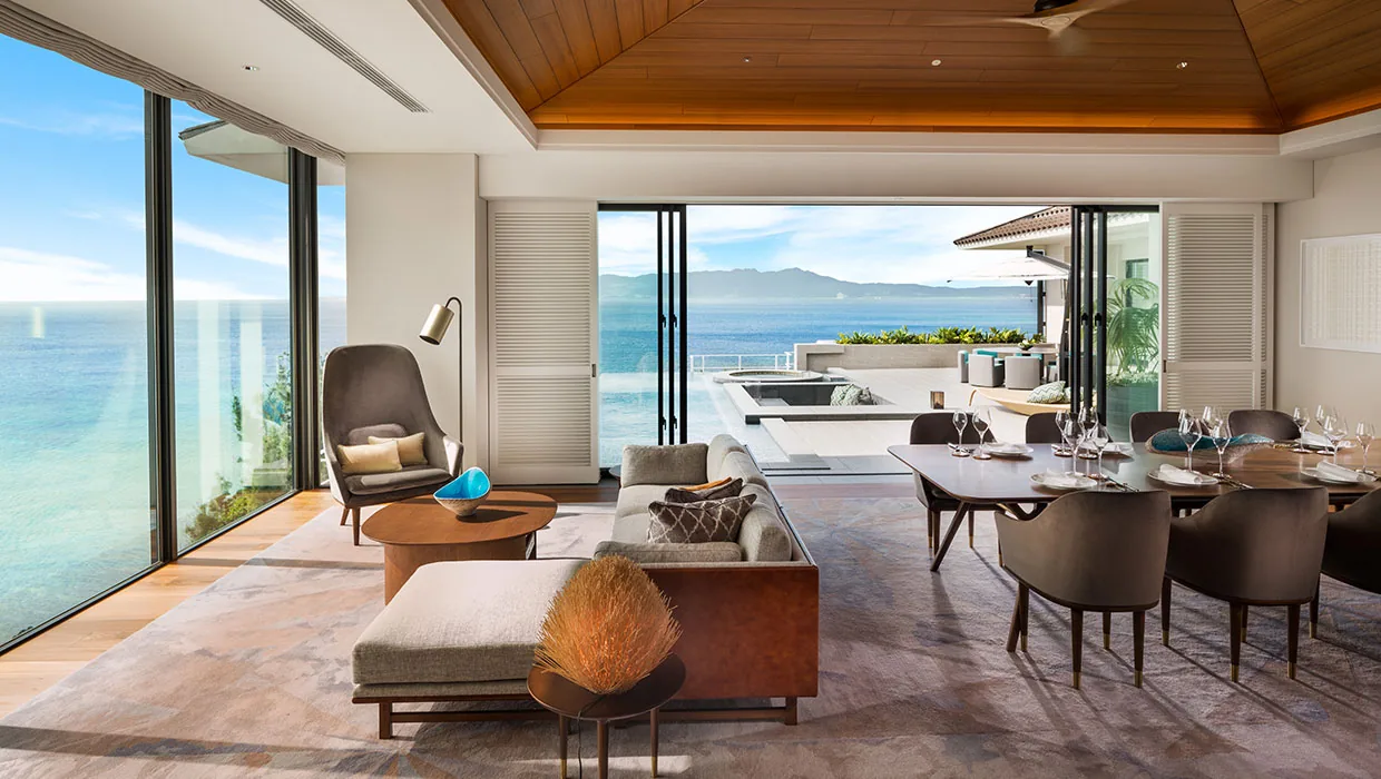 The living room of the top Orchid Suite, with panoramic sea views, at Halekulani Okinawa