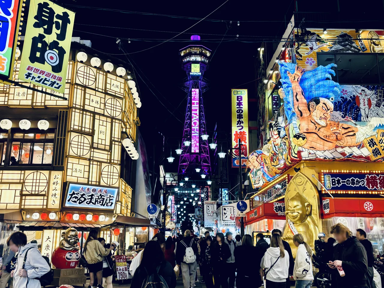 Tsutenkaku Tower rising over the retro Shinsekai district in Osaka Tsutenkaku Tower rising over the retro Shinsekai district in Osaka