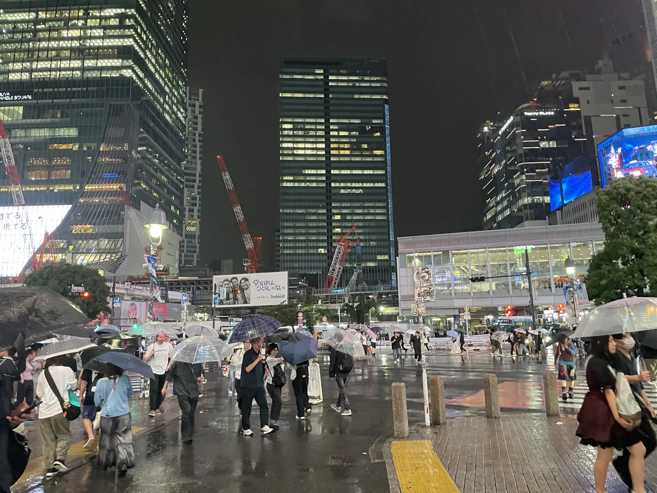 Shibuya Scramble Crossing at night in the rain, Tokyo Shibuya Scramble Crossing at night in the rain, Tokyo