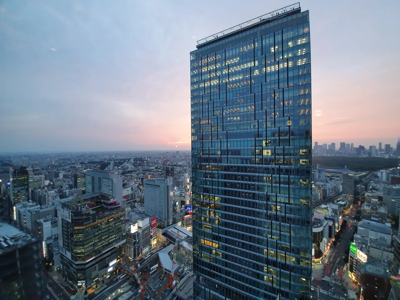 Shibuya Scramble Square building at sunset, home to the Shibuya Sky observation deck Shibuya Scramble Square building at sunset, home to the Shibuya Sky observation deck