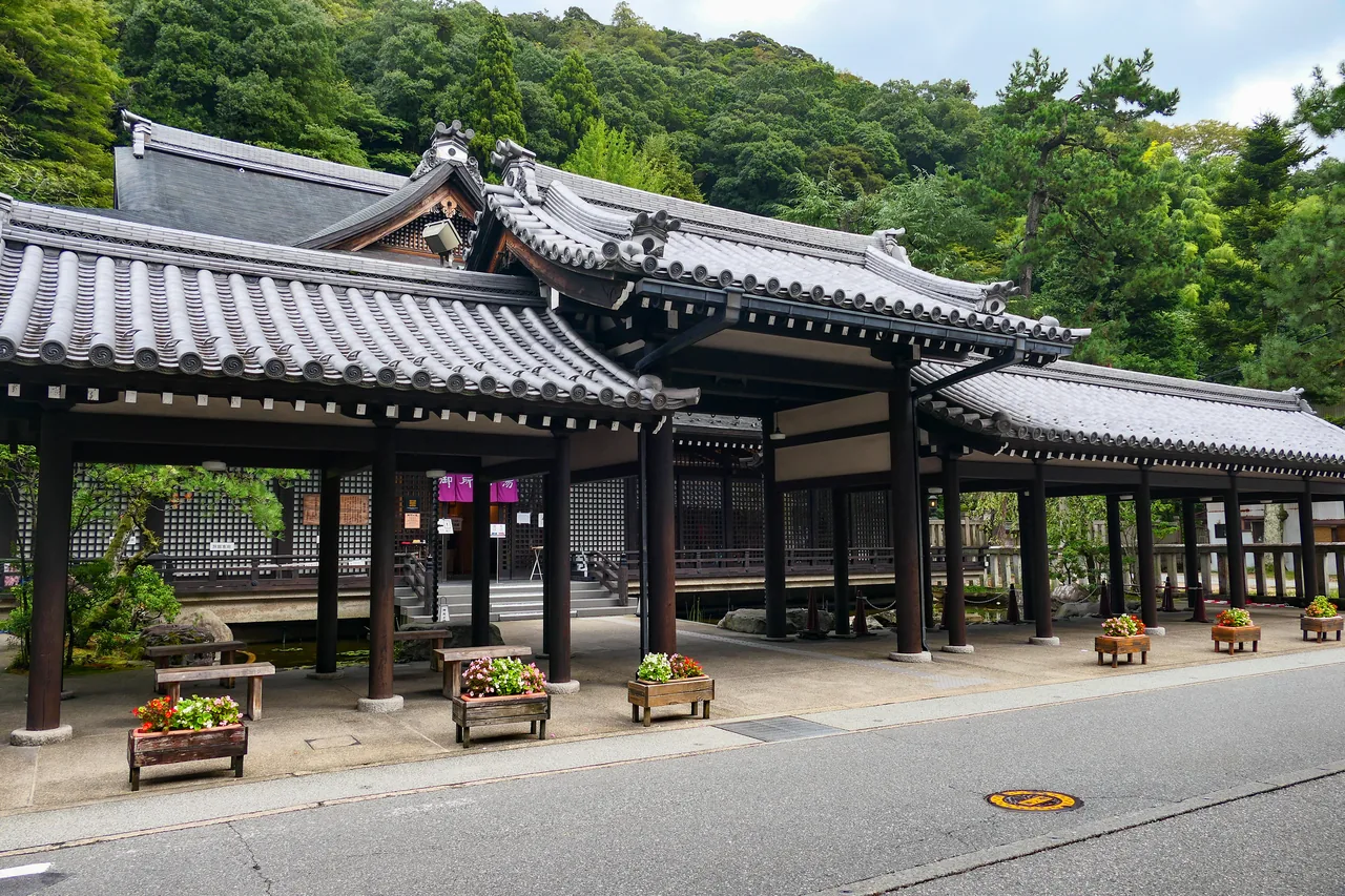 The tiled roof and open frontage of Gosho-no-yu, one of the six public baths at Kinosaki Onsen The tiled roof and open frontage of Gosho-no-yu, one of the six public baths at Kinosaki Onsen