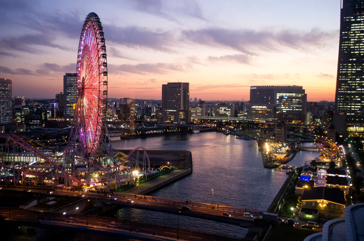 The Tempozan Ferris wheel lit up at dusk above Osaka Bay