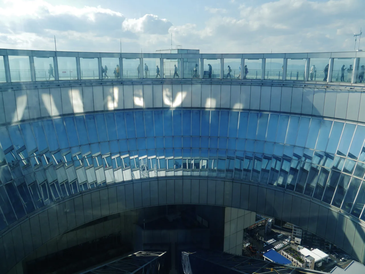 The circular open-air deck of the Umeda Sky Building observatory seen from below
