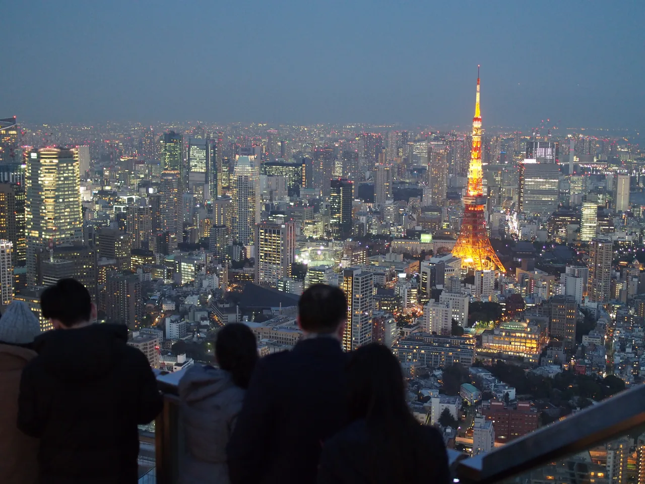 Dusk over Tokyo from Roppongi Hills with Tokyo Tower lit in the middle distance Dusk over Tokyo from Roppongi Hills with Tokyo Tower lit in the middle distance