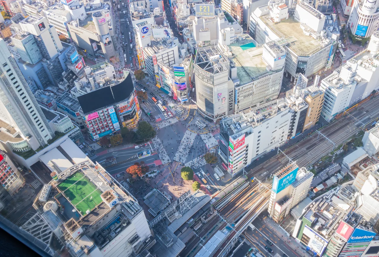 The Shibuya scramble crossing seen from directly above at Shibuya Sky The Shibuya scramble crossing seen from directly above at Shibuya Sky
