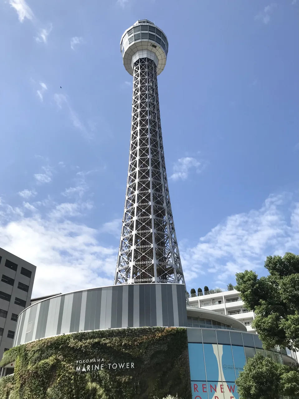 Yokohama Marine Tower seen from below, its lattice steel frame rising to the observation deck