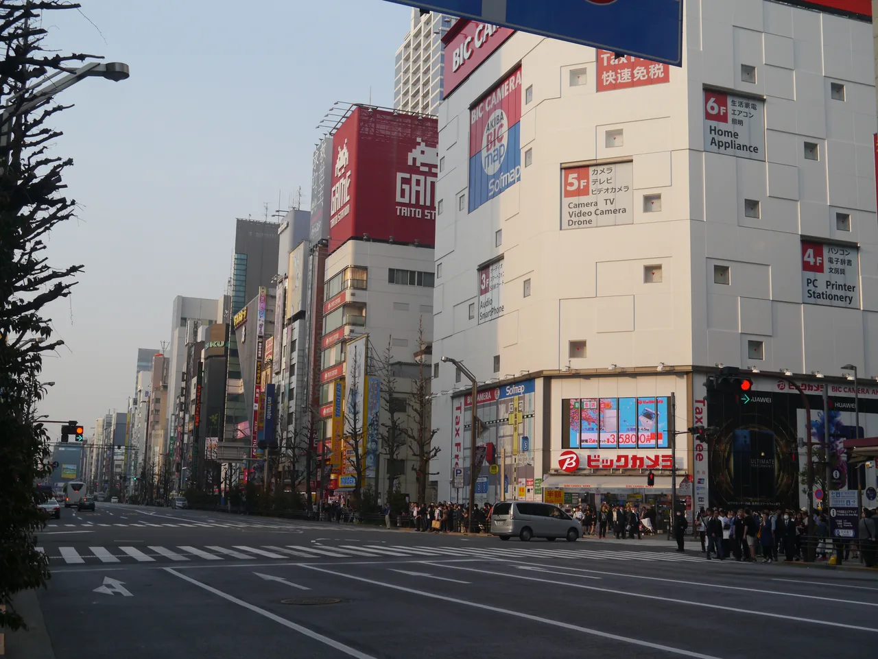 Shop signs stacked up the buildings along Chuo-dori in Akihabara, Tokyo Shop signs stacked up the buildings along Chuo-dori in Akihabara, Tokyo