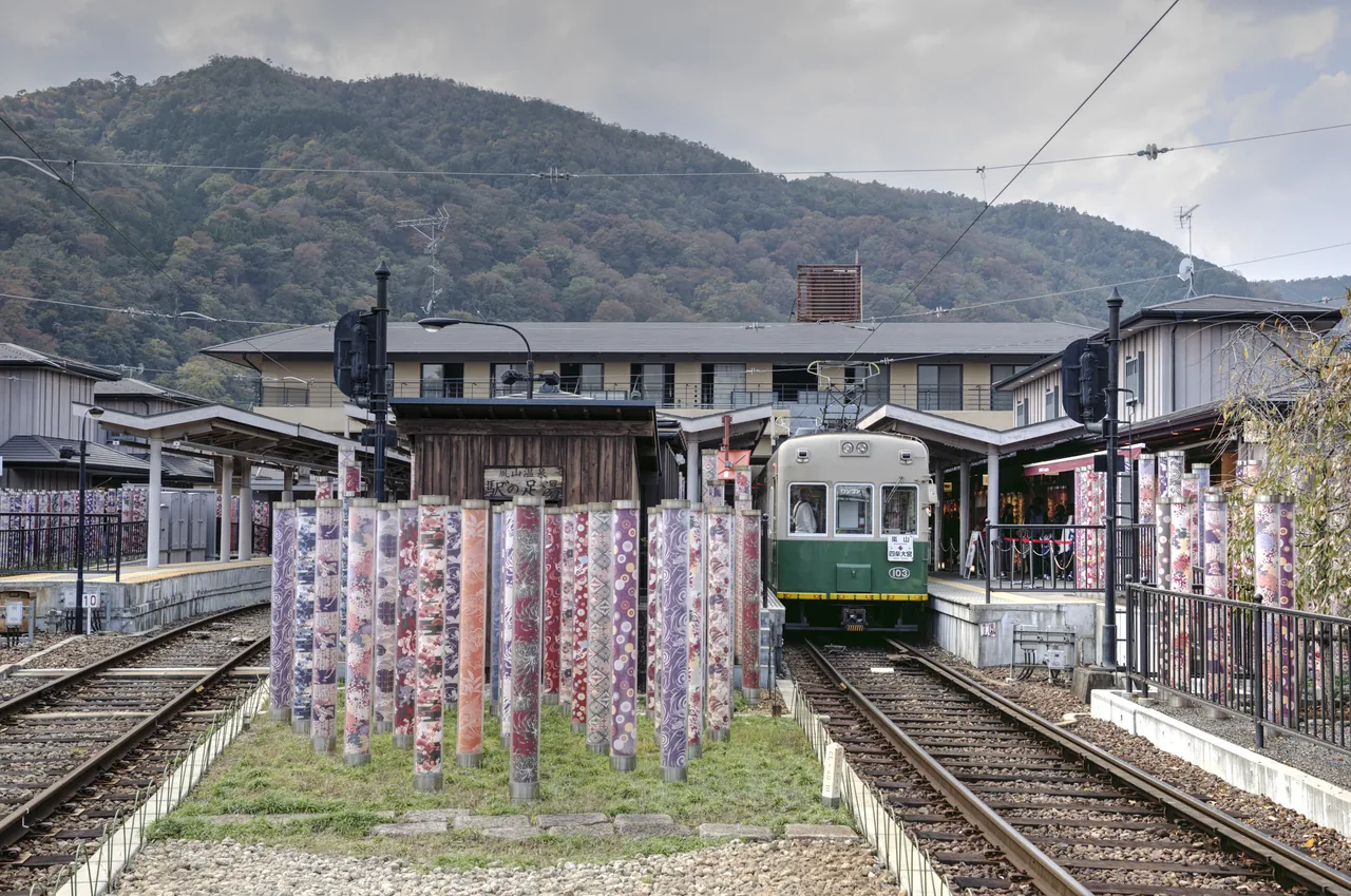 A Randen tram waiting at the platform of Arashiyama station in Kyoto