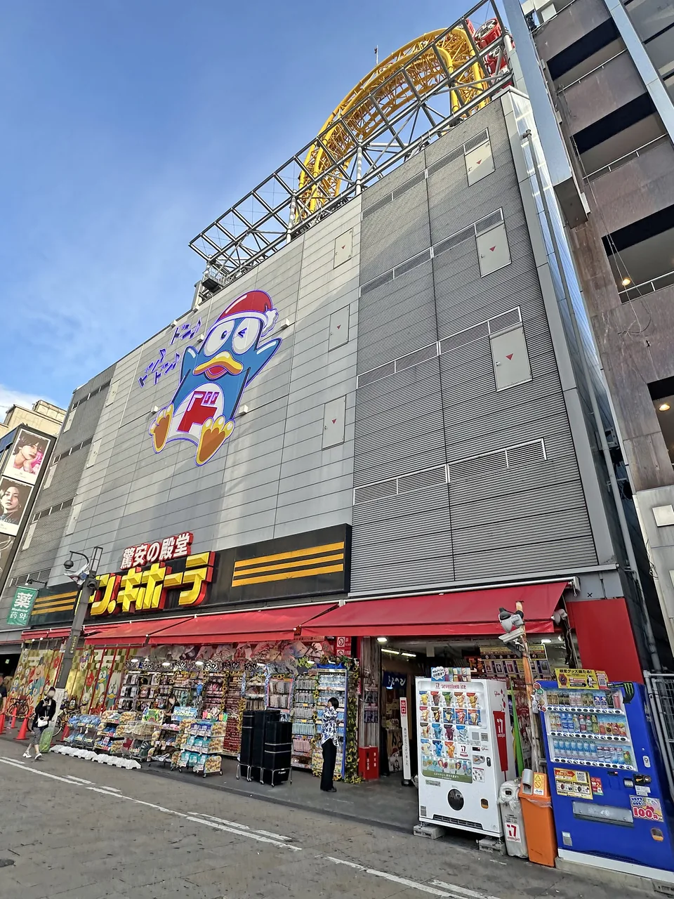 The Don Quijote store on the Dotonbori canal in Osaka with its signage lit