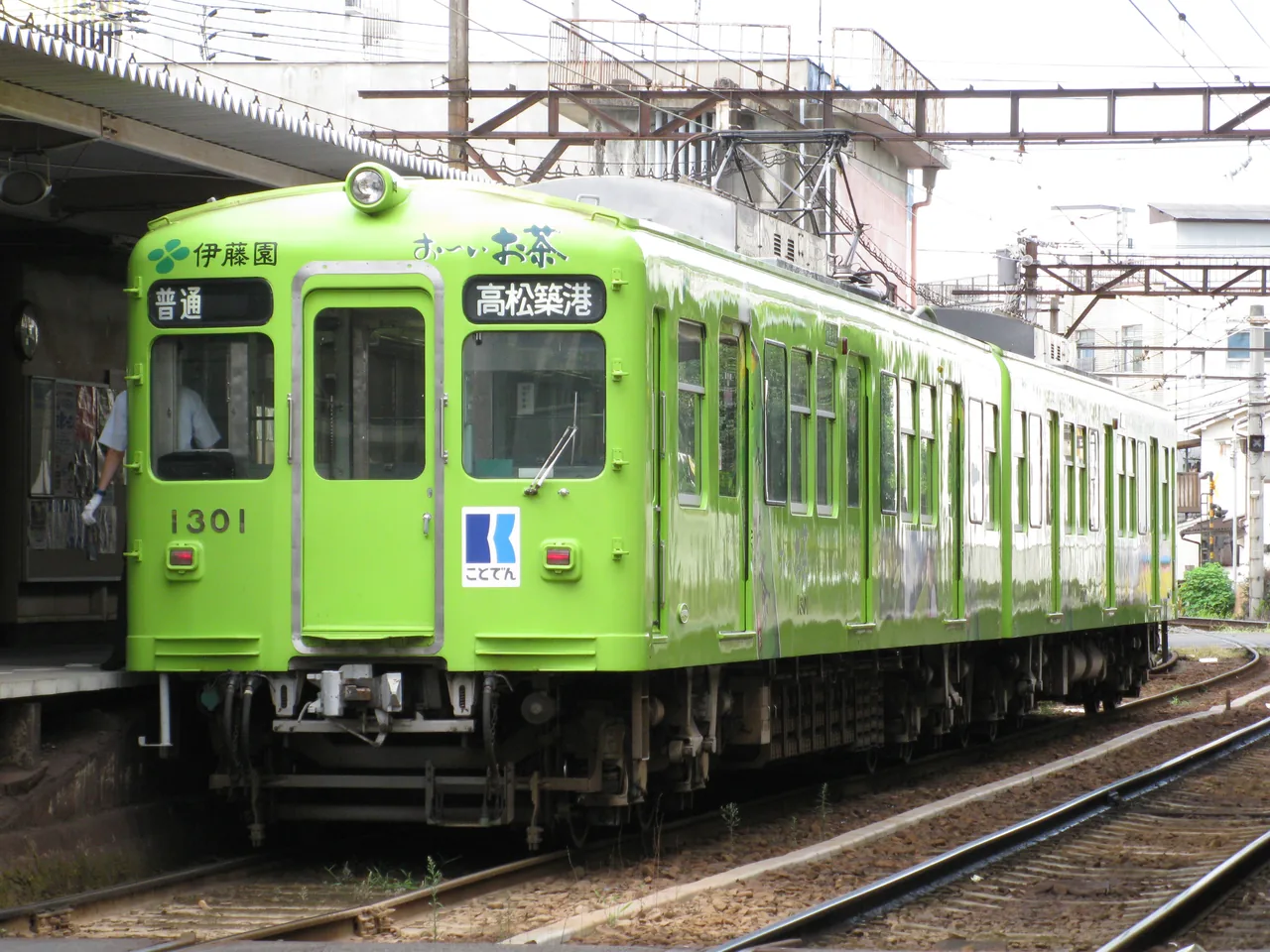 A Kotoden local train at a platform in Takamatsu