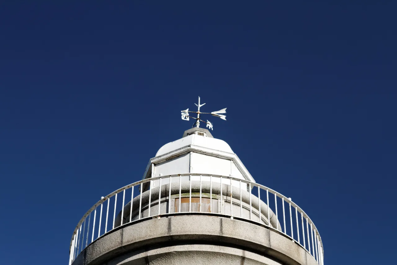 The granite lighthouse standing at the end of Ogijima